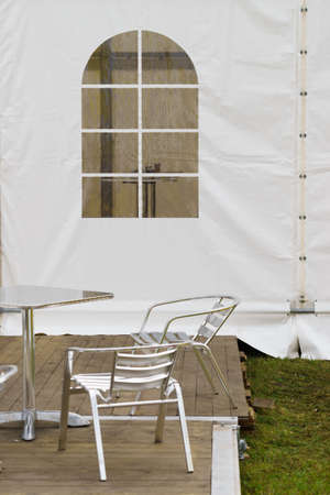 Plastic transparent window in white event tent. Abstract details objects.の写真素材