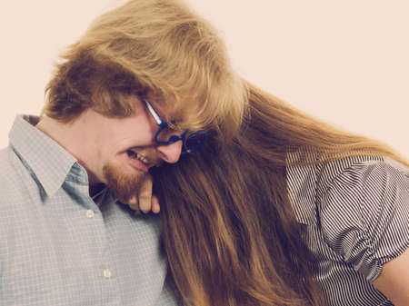 Hysterical man and woman crying. Two buddies or couple having bad time being sad and depressed.