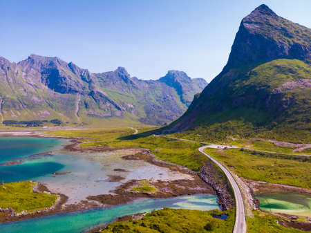 Norwegian scenic landscape on Lofoten archipelago. Road trough islands and sea. National tourist route 10 Norway. Aerial viewの写真素材