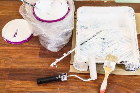 Home renovation, walls color change, diy concept. White paint with essentials equipment.の写真素材