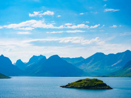 Scenic fjord landscape above the arctic circle, coast nature with sharp mountain peaks, Lofoten...