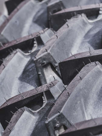 Tires treads changing, automotive concept. Detailed closeup of rubber tire wheel surface.