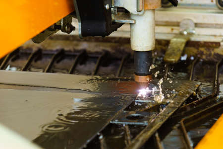 Close up of industrial milling machine CNC. Steel cutting, metalworking technology in production...