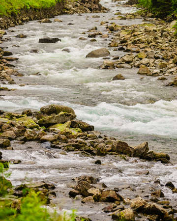 River stream in mountains, Norway nature landscape