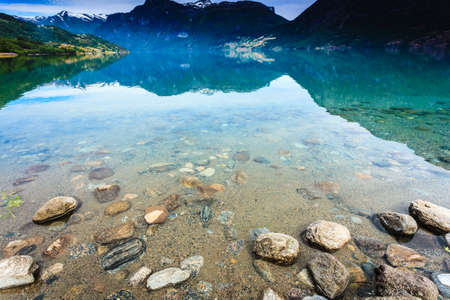 Tourism vacation and travel. Mountains landscape and lake Oppstrynsvatnet in Jostedalsbreen National...
