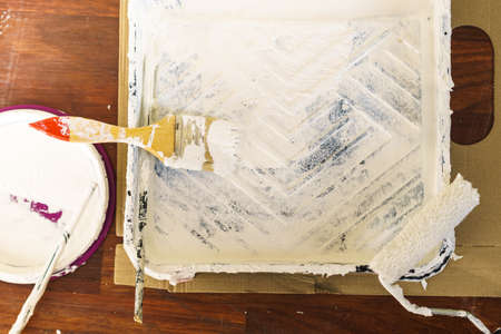 Home renovation, walls color change, diy concept. White paint with essentials equipment.の写真素材