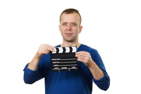 Film producer guy holding movie clapping slate. Man working in arts and entertainmentの写真素材