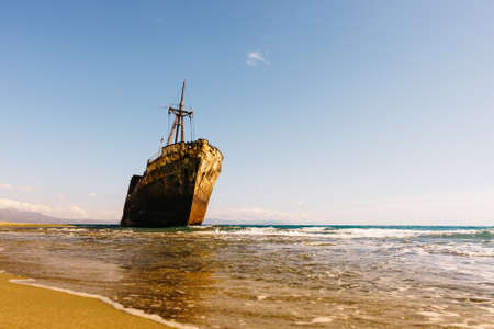 Greek coastline with the famous rusty shipwreck Dimitrios in Glyfada beach near Gytheio, Gythio Laconia Peloponnese Greece.の写真素材