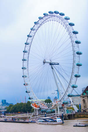 LONDON, ENGLAND UK - SEPTEMBER 20, 2014: London eye on September 20, 2014, England. The London Eye is a giant ferris wheel situated on the banks of the River Thames.のeditorial素材