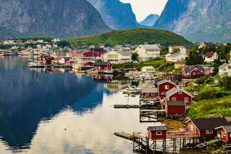 Scenic fjord landscape with Reine village, coast nature with sharp high mountain peaks, Lofoten islands North Norway. Travel destination.のeditorial素材