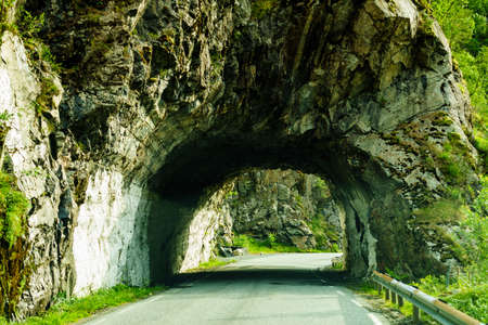 Road with tunnel in summer mountains, Narwayの写真素材