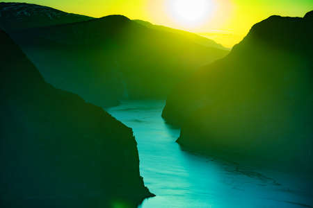 Aurlandsfjord fjord landscape at sunset, Norway Scandinavia. National tourist route Aurlandsfjelletの写真素材