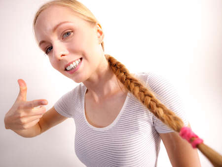 Blonde girl with braid hair. Haircare, hairstyling.の写真素材