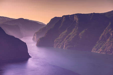 Aurlandsfjord fjord landscape at sunset, Norway Scandinavia. National tourist route Aurlandsfjelletの写真素材