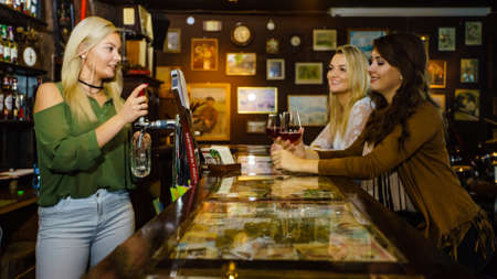 KARTUZY, POLAND - OKTOBER 27, 2018: People inside Antykvariat Cafe in Kartuzy city, Kashubia Polandのeditorial素材