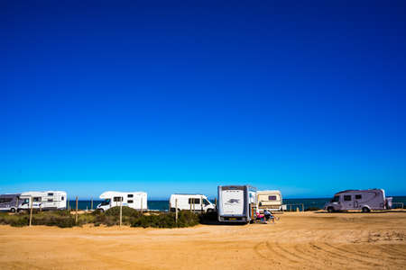 SANTA POLA, SPAIN - FEBRUARY 16, 2019: Campers, recreational vehicles on mediterranean coast of...