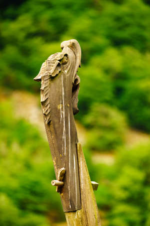 Part of old wooden viking boat in norwegian nature. Tourism and traveling conceptの写真素材