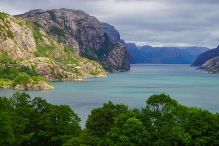 Norwegian landscape. Mountains hills and fjord.の写真素材