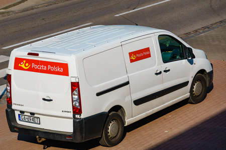 GDYNIA, POLAND - JUNE 26, 2019: Poczta Polska mail delivery van on city street. Poczta Polska...