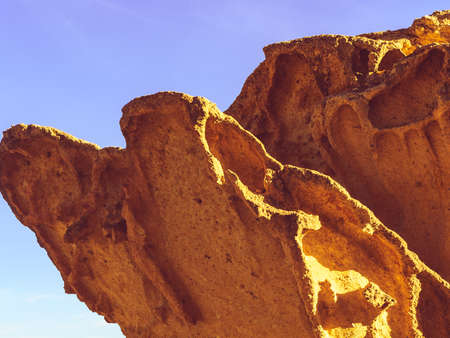 The Enchanted City of Bolnuevo, yellow sandstone shapes, rock formations, Murcia Spain. Tourist...