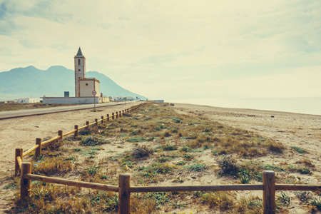 Church of San Miguel on coastal road in in Almadraba de Monteleva, Cabo de Gata Nijar Natural Park, Andalusia Spain.の写真素材