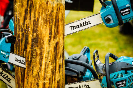 Bednary near Poznan, Poland - September 20, 2019: Agroshow in Poland. Makita brand chainsaw. Makita is one of the oldest manufacturers of portable gasoline chainsaws.のeditorial素材