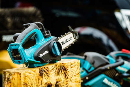 Bednary near Poznan, Poland - September 20, 2019: Agroshow in Poland. Makita brand chainsaw. Makita is one of the oldest manufacturers of portable gasoline chainsaws.のeditorial素材