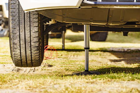 Camper leveling support hydraulic steady leg in use. Caravaning and accessories for motor home.の写真素材