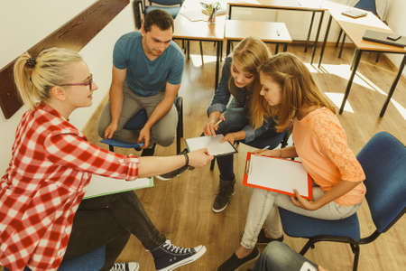 Team collaboration meeting start up concept. Male and female diversity young people studying working...