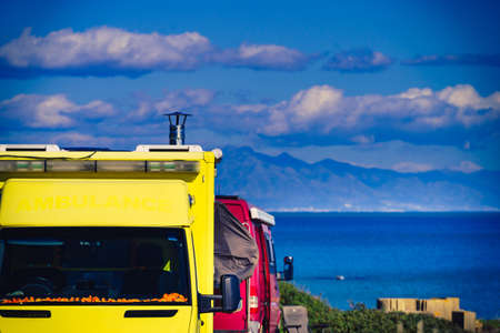 Caravan recreational vehicle on mediterranean coast in Spain. Camping on nature. Vacation and travelling in mobile home.の写真素材