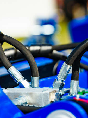 Hydraulic system hoses of modern heavy machine. Industrial machinery. Technology. Agriculture...