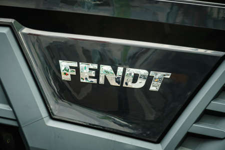 Bednary near Poznan, Poland - September 20, 2019: Logo of brand Fendt on agricultural machine. Fendt...