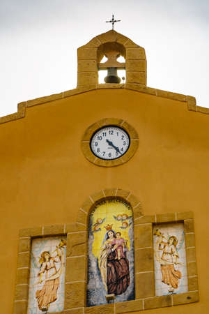 Isla Plana, Spain - March 24, 2019: Church Ermita de Nuestra Senora del Carmen at promenade walking area, Mazarron Murcia Spain. Tourist place.のeditorial素材