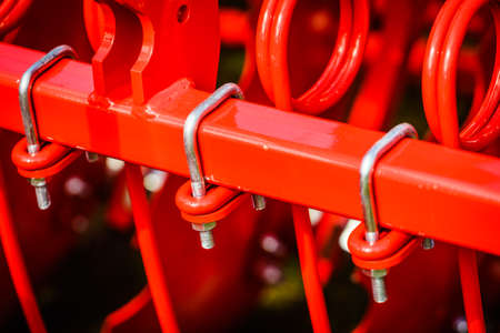 Agriculture equipment. U bolt at agricultural machinery, detail view.の写真素材