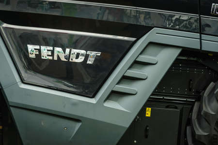 Bednary near Poznan, Poland - September 20, 2019: Logo of brand Fendt on agricultural machine. Fendt...