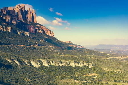 Camper car recreational vehicle with alcove parking on roadside. Holidays and travel in motor home.の写真素材