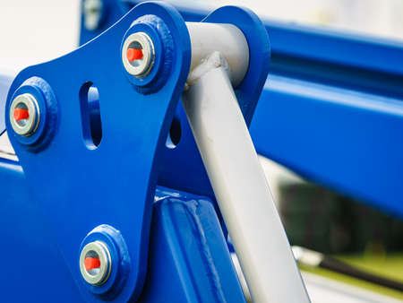 Hydraulic mechanism on modern machine. Industrial detail piston in machinery. Technology.の写真素材