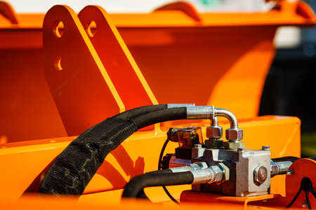 Hydraulic system hoses of modern heavy machine. Industrial machinery. Technology. Agriculture...