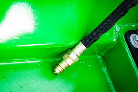 Pneumatic hose pipe in modern heavy machine. Industrial machinery. Technology. Agriculture...