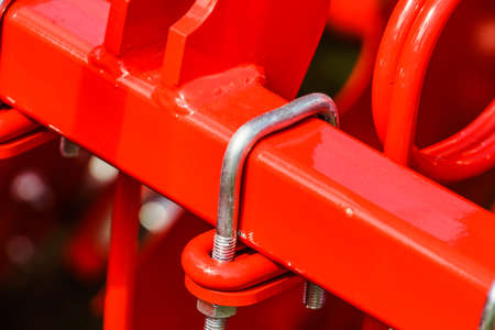 Agriculture equipment. U bolt at agricultural machinery, detail view.の写真素材