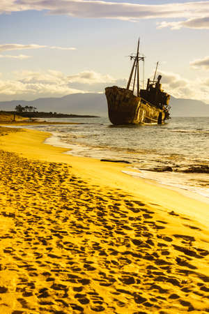 Greek coastline with the famous rusty shipwreck Dimitrios in Glyfada beach near Gytheio, Gythio Laconia Peloponnese Greece.の写真素材