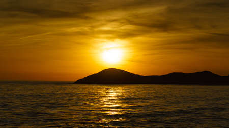 Sunset over the sea Seaside landscape. Natural park of Calblanque in Cartagena, Murcia Spain.の写真素材