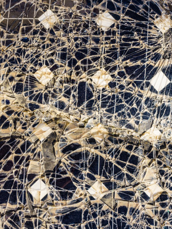 Broken destroyed cracked solar photovoltaic panel, charging batteries.