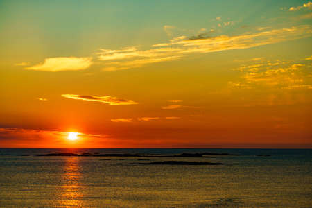 Seascape on Andoya island, rocky coastline at midnight sun during summer, Vesteralen archipelago,...