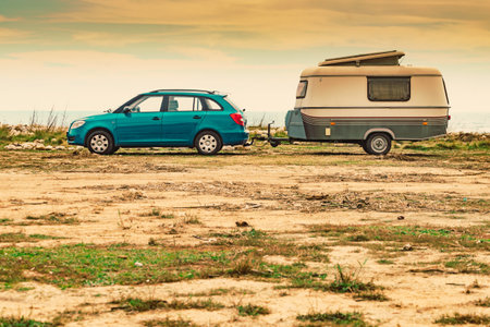 Caravan trailer camping on seashore. Capicorb, Valencia region Spain. Vacation with mobile home.の写真素材