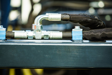 Hydraulic system hoses of modern heavy machine. Industrial machinery. Technology. Agriculture equipment.の写真素材