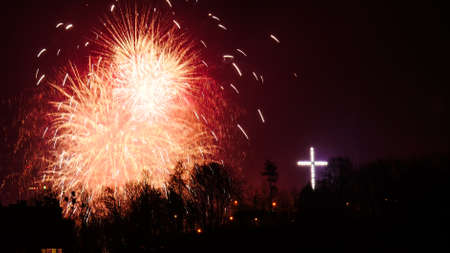 Firework explosion in the sky, celebrating new year in Gdynia city, Poland. Colorful fireworks at holiday night.の写真素材
