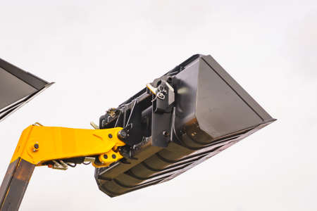 Industrial hay telehandler against sky. Telescopic handler. Agricultural machinery, farm equipment....
