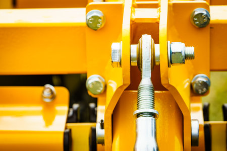 High strength steel turnbuckle, stretching screw or bottlescrew in machine. Machinery industrial detailの写真素材