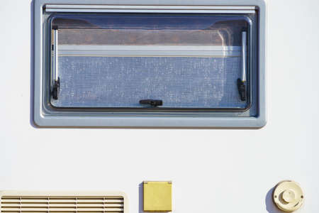 Details of camper car recreation vehicle, window roller shades blind